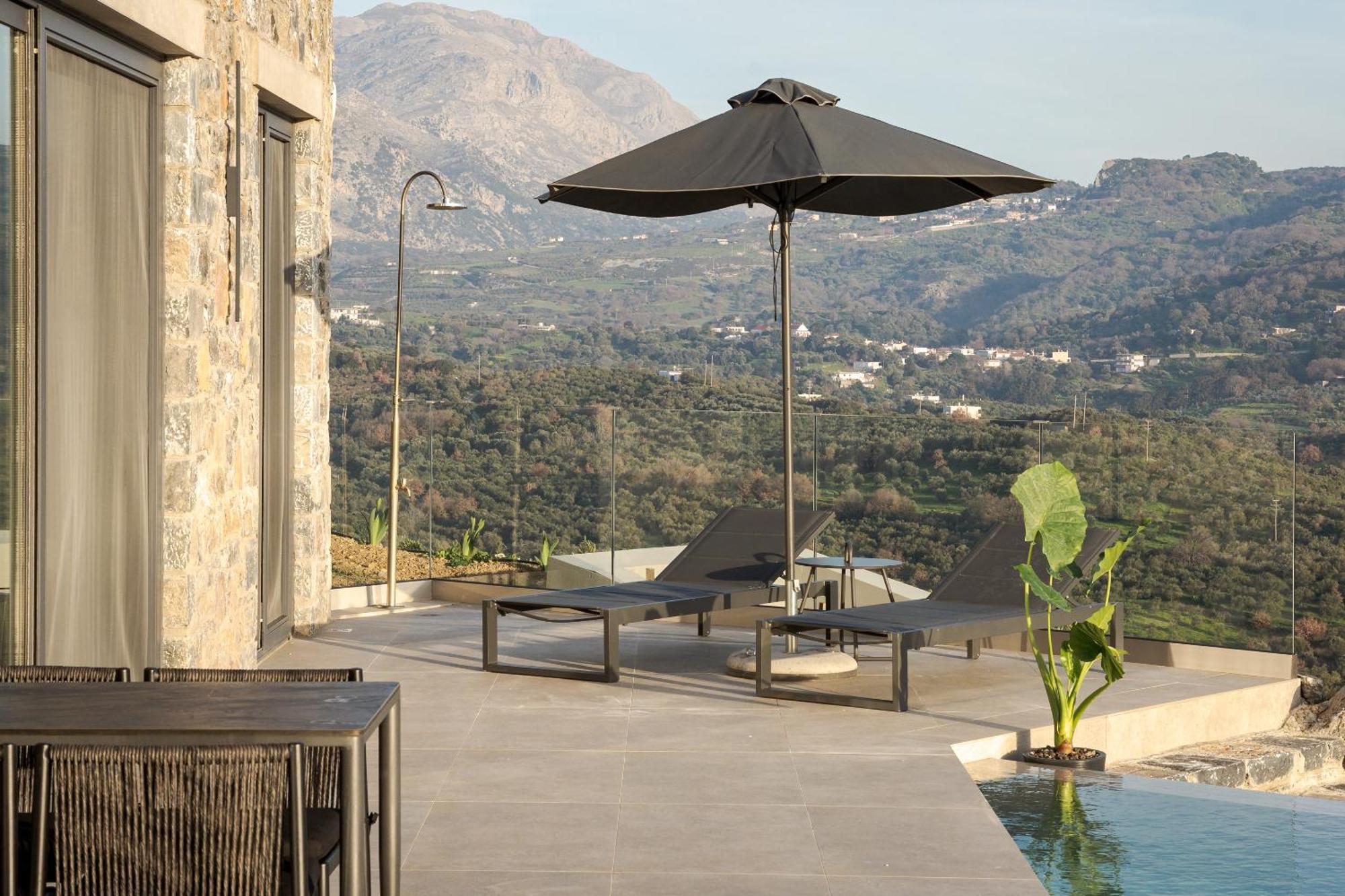 Neromai Cave Luxury Villas Koxaré Szoba fotó