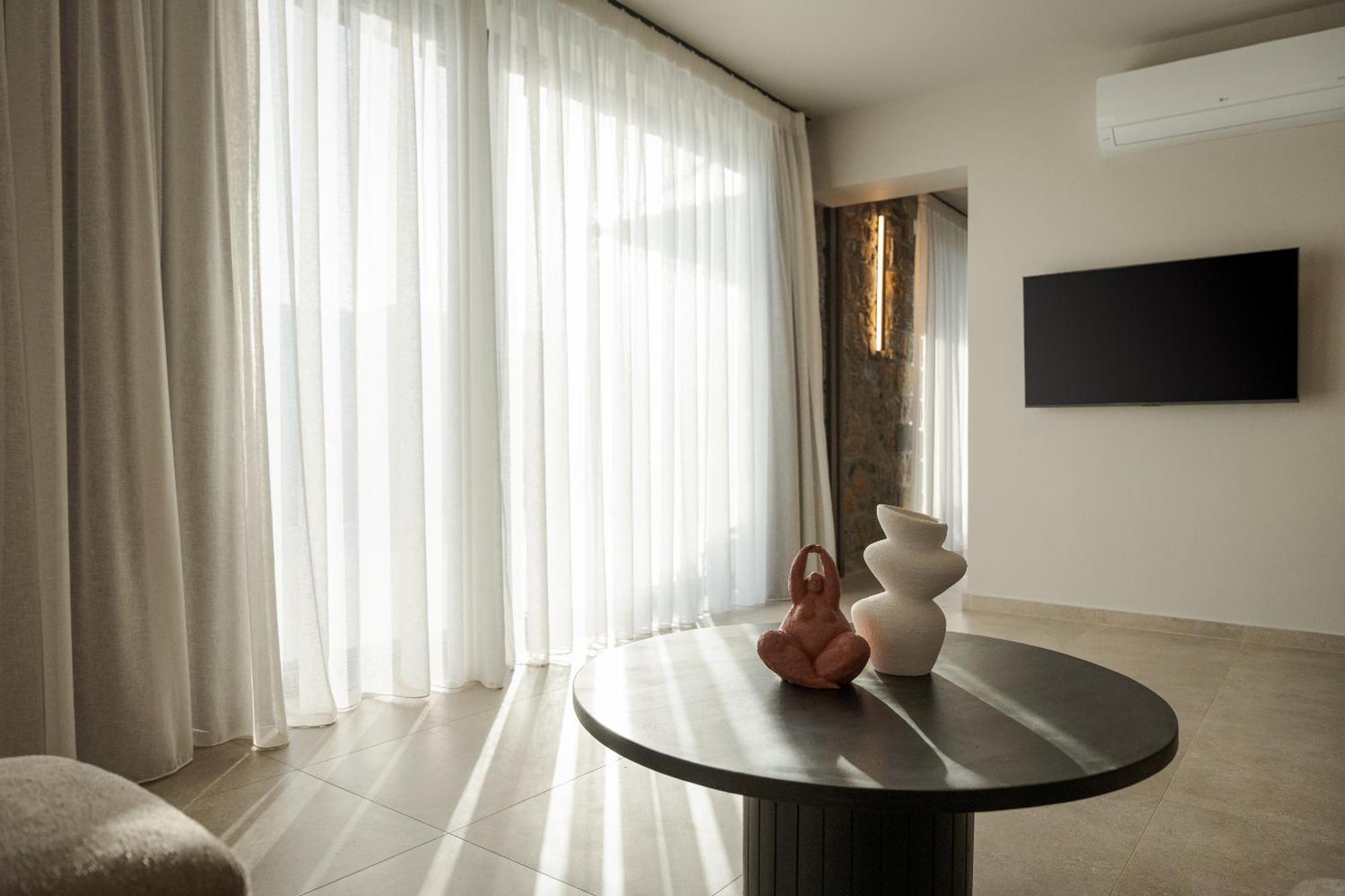 Neromai Cave Luxury Villas Koxaré Szoba fotó