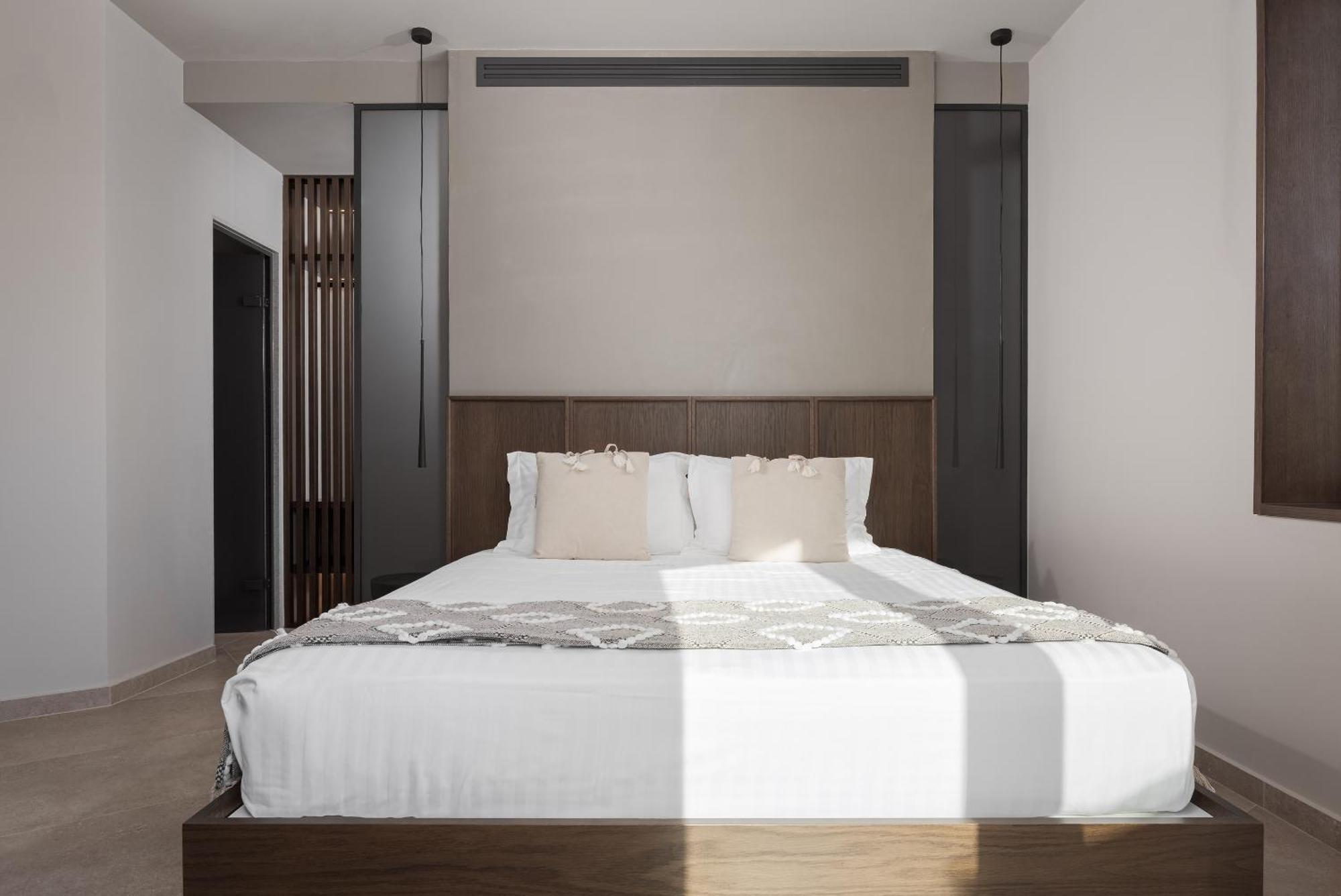 Neromai Cave Luxury Villas Koxaré Szoba fotó